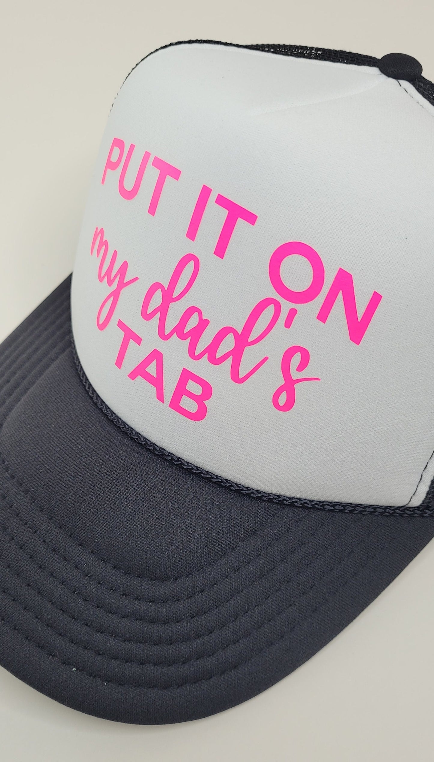 Put it on HIS (Dad/ Husband's) Tab Trucker Hat