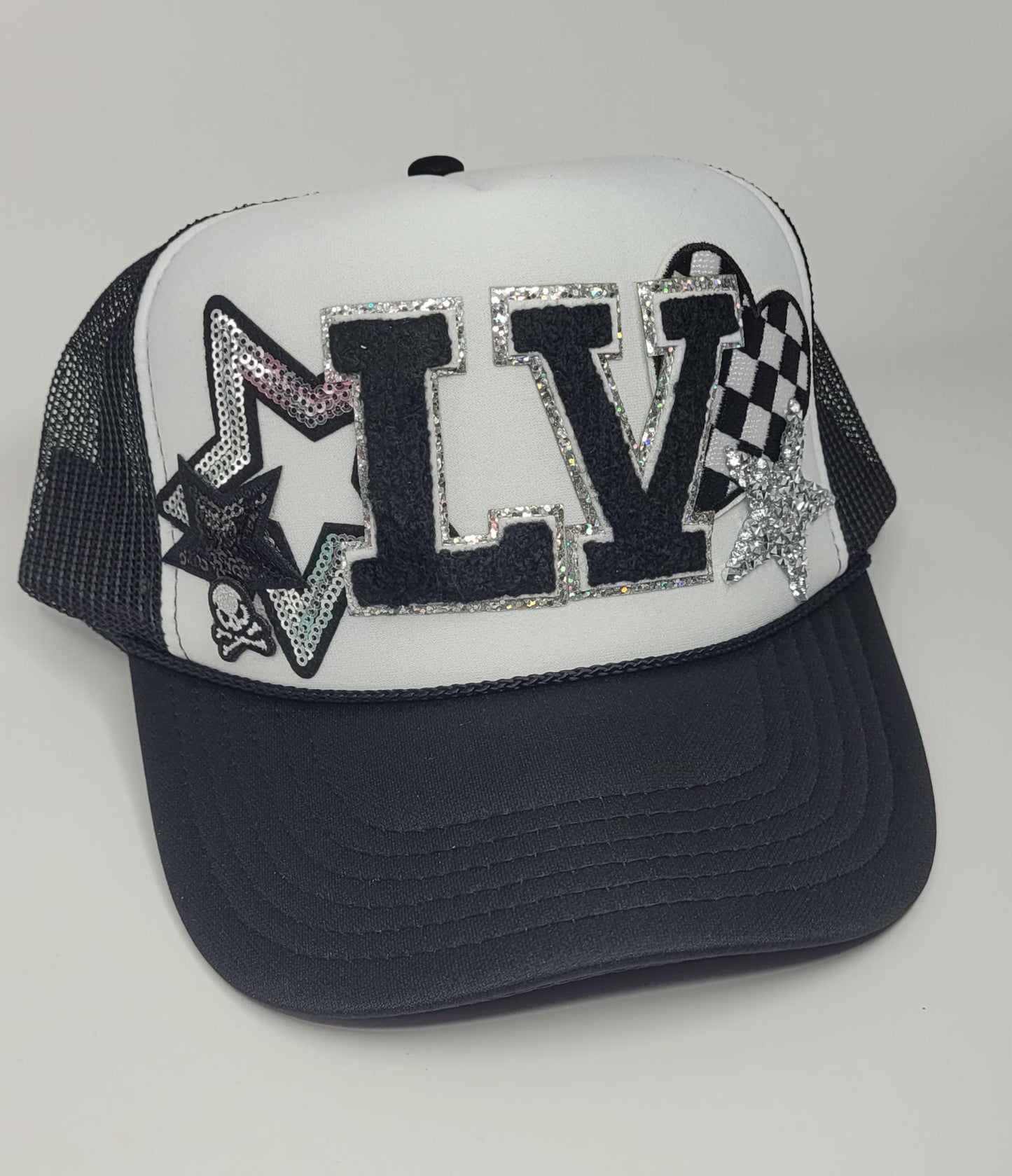 Custom LV Raiders-Inspired Trucker Hat – Silver Glitter & Skull Patch Design
